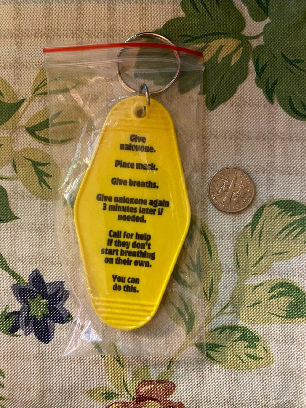 Brand New Yellow Plastic Hotel Key Fob with Overdose Instructions for Narcan